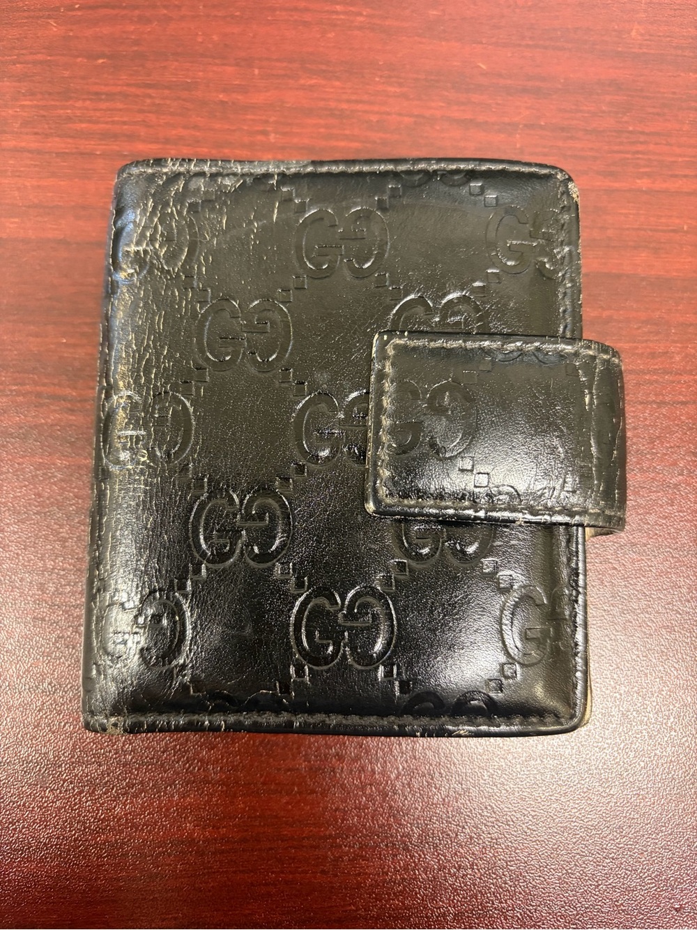 Gucci Black Embossed GG Leather Wallet